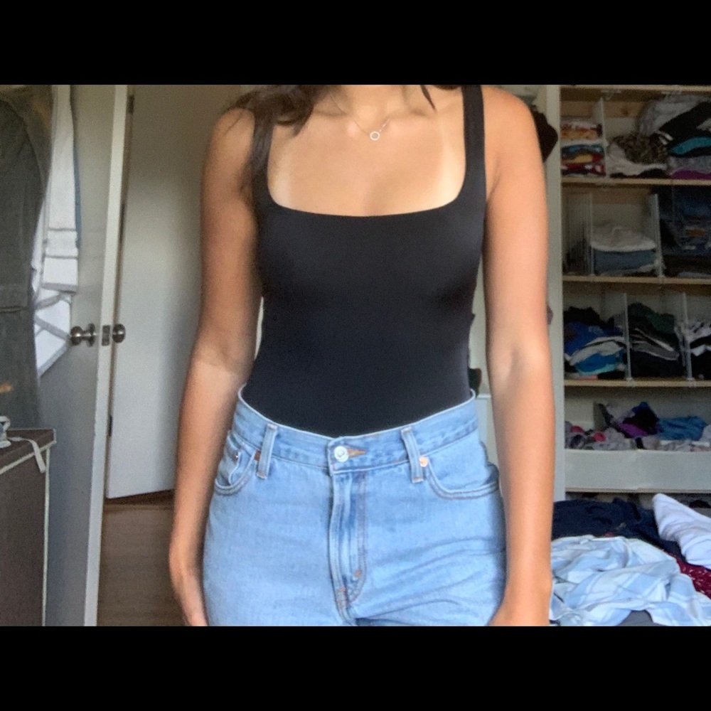 Sleek & flattering black bodysuit from Showpo!